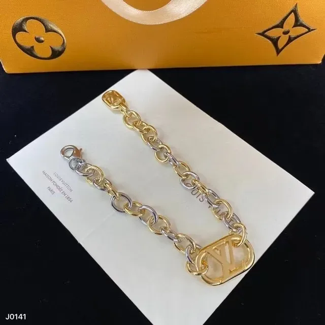 Louis Vuitton Gold Silver Metal Openwork LV Monogram Earrings 6