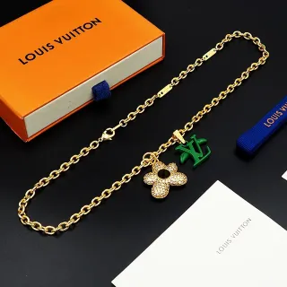 Louis Vuitton collier pendentif fleur de cristal doré et monogramme LV vert