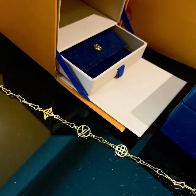 Louis Vuitton Gold-Tone LV Monogram Charm Link Bracelet 6