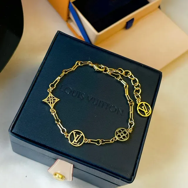 Louis Vuitton Gold-Tone LV Monogram Charm Link Bracelet 7