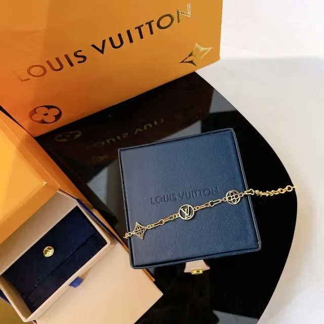 Louis Vuitton Gold-Tone LV Monogram Charm Link Bracelet 9
