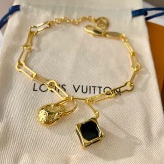 Louis Vuitton Lock Me Cadena de eslabones Oro Negro LV Monogram Encanto Oval Pulsera
