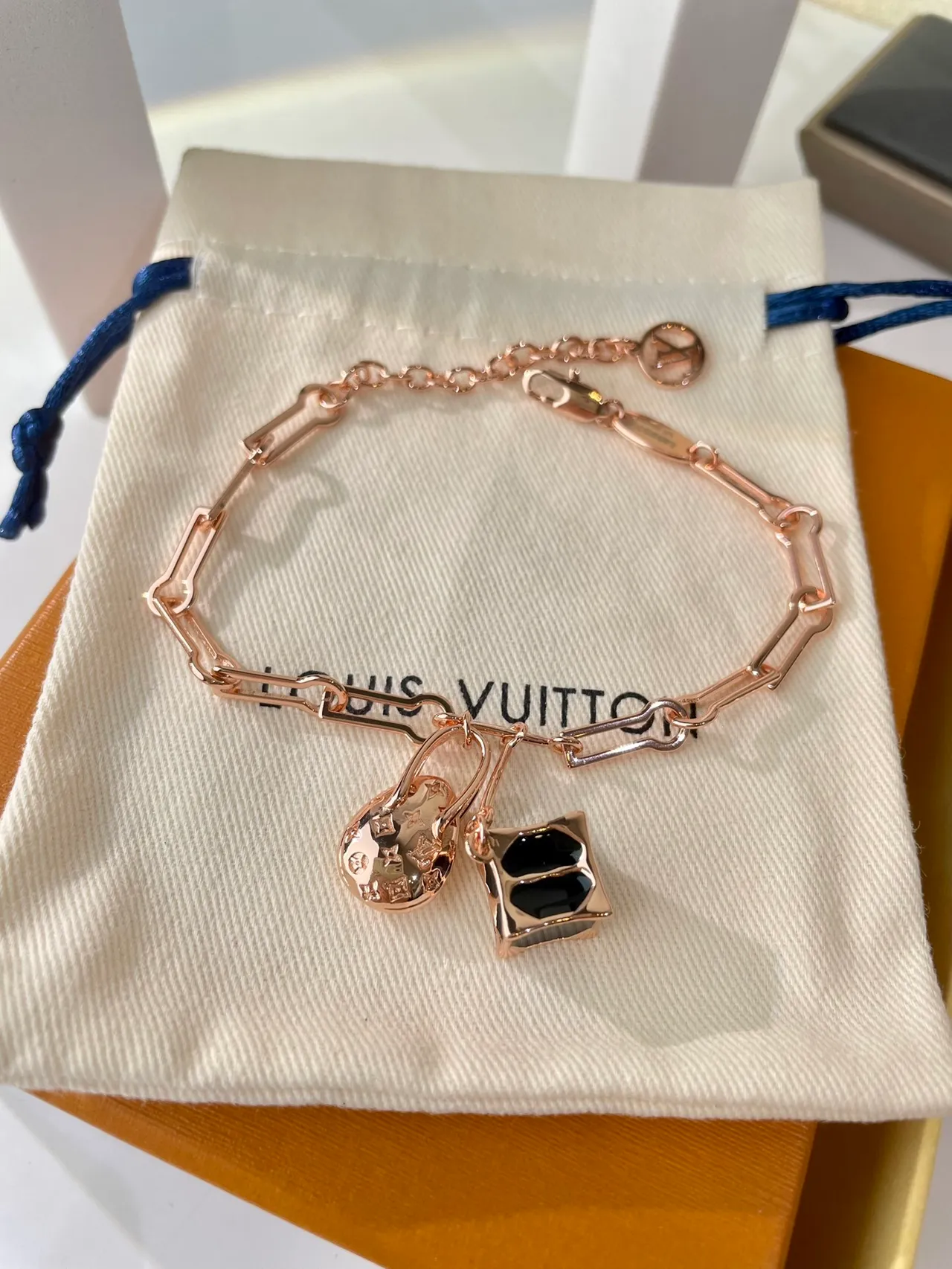 Louis Vuitton Lock Me Gold Black Link Chain LV Monogrammed Oval Charm Bracelet 2
