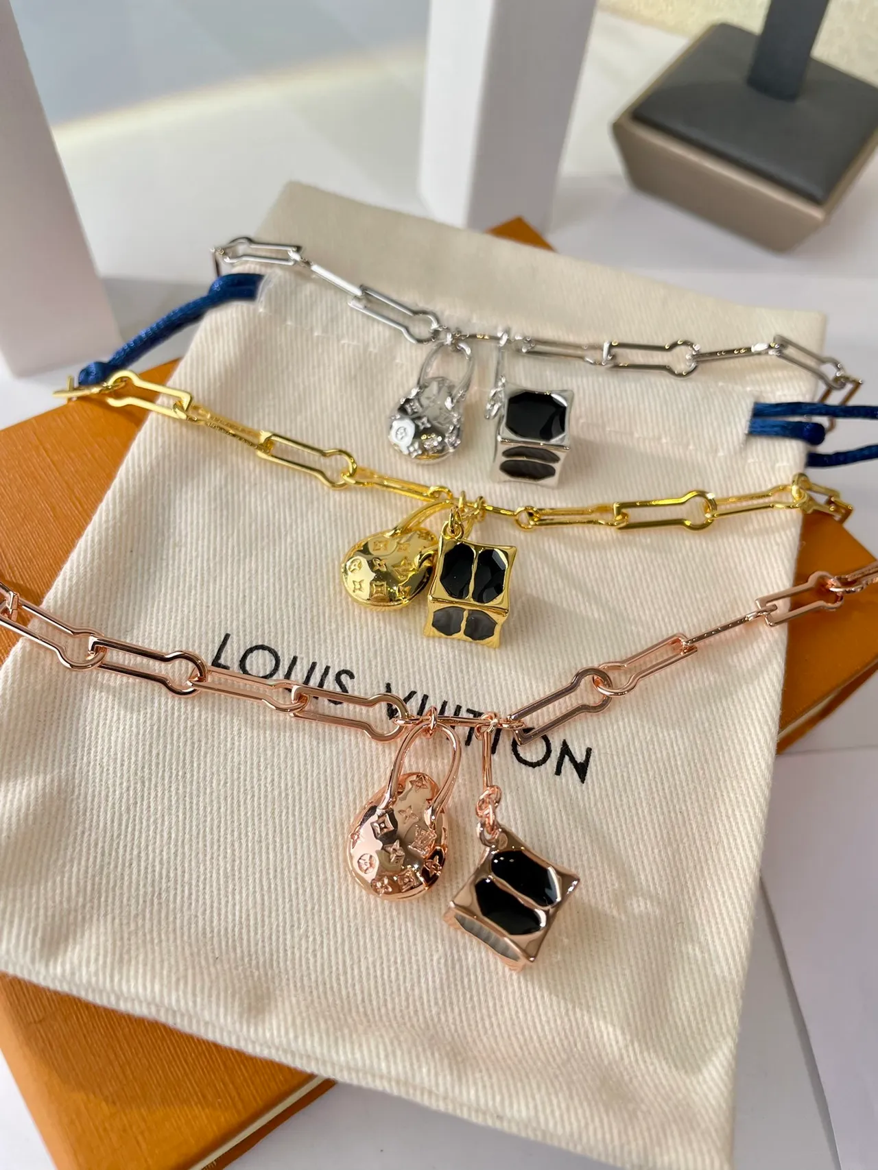 Louis Vuitton Lock Me Gold Black Link Chain LV Monogrammed Oval Charm Bracelet 3