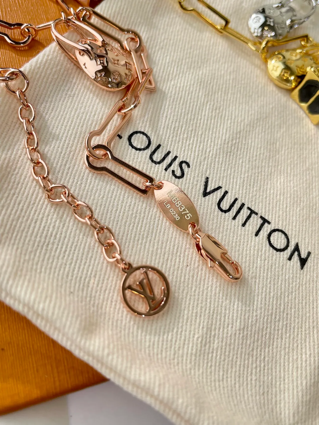 Louis Vuitton Lock Me Gold Black Link Chain LV Monogrammed Oval Charm Bracelet 7
