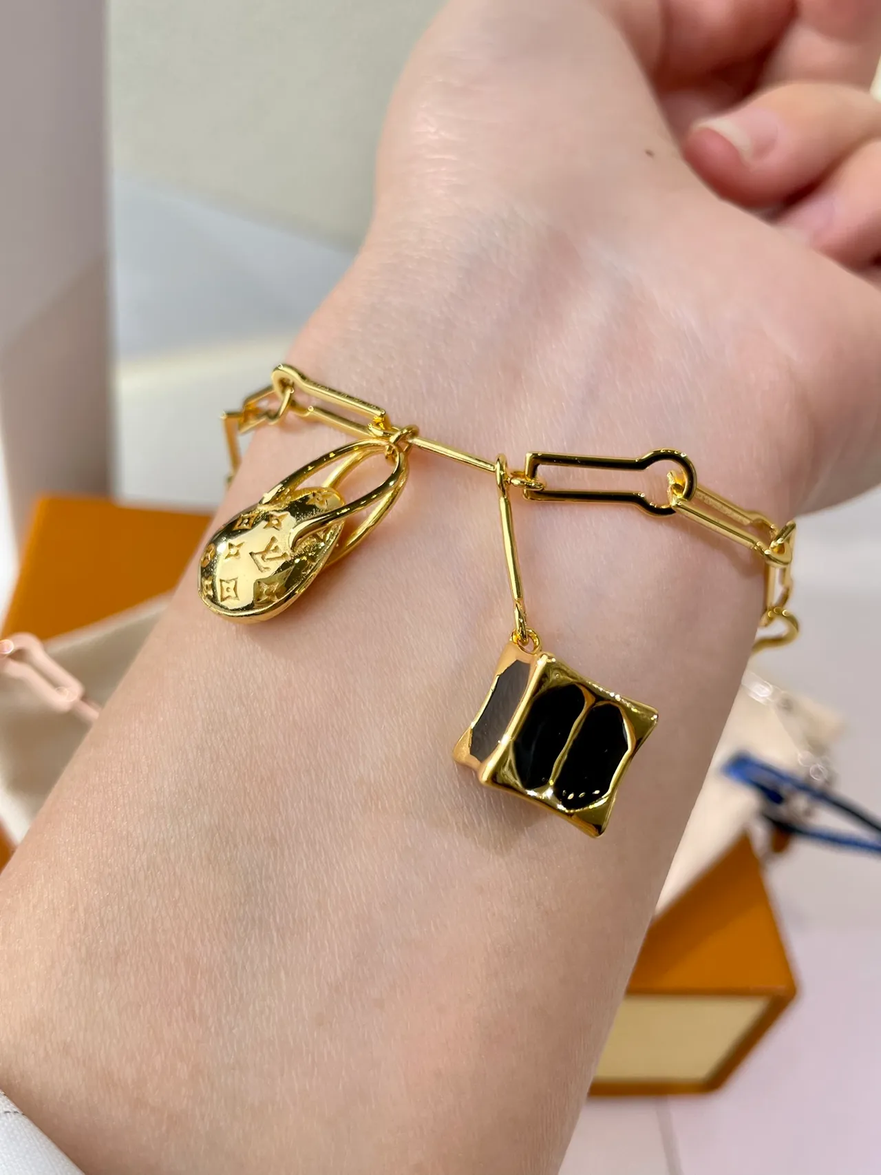 Louis Vuitton Lock Me Gold Black Link Chain LV Monogrammed Oval Charm Bracelet 8