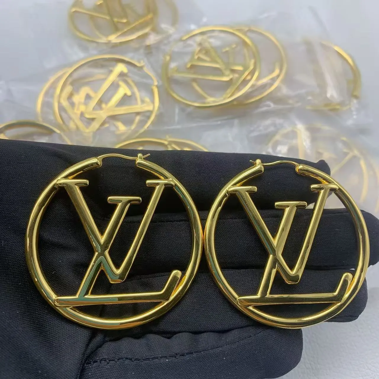 Louis Vuitton LV Circle Hoop Gold Monogram-Integrated Earrings 3