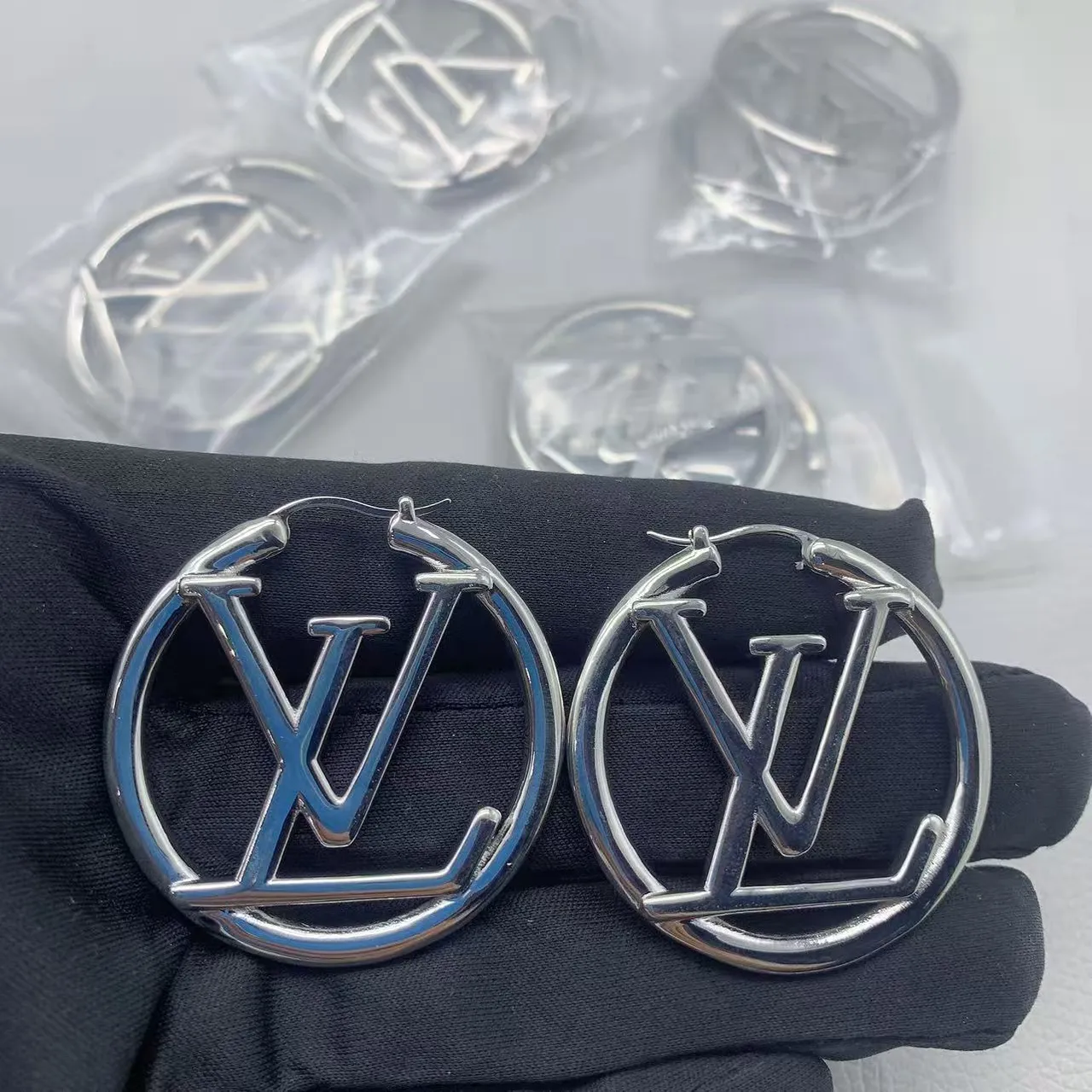 Louis Vuitton LV Circle Hoop Gold Monogram-Integrated Earrings 4