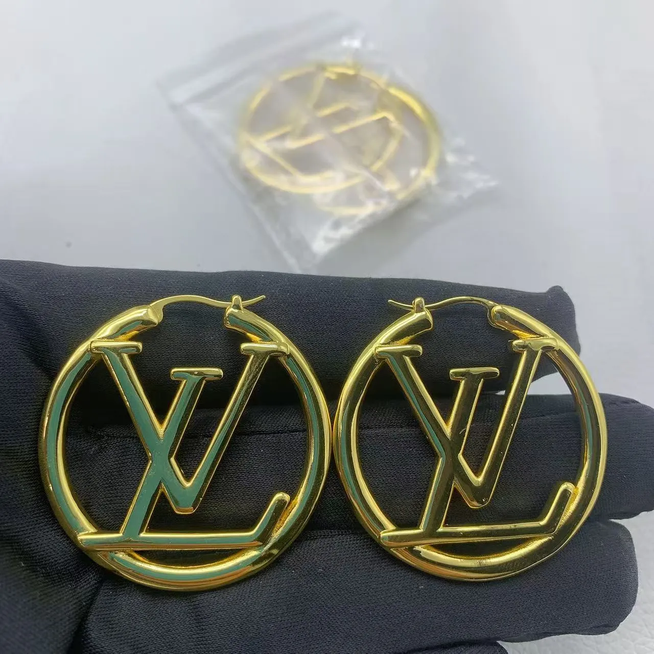 Louis Vuitton LV Circle Hoop Gold Monogram-Integrated Earrings 5