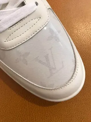 Louis Vuitton LV Trainer White Monogram-Coated Leather Circular Embossed Medallion Lifestyle Sneakers 2