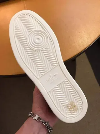 Louis Vuitton LV Trainer White Monogram-Coated Leather Circular Embossed Medallion Lifestyle Sneakers 7