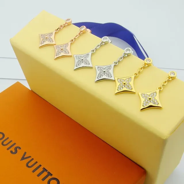 Louis Vuitton boucles d'oreilles monogramme fleur quatrefoil pavé cristal goutte 4