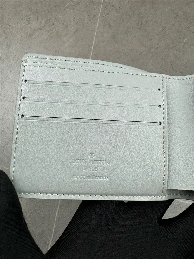 Louis Vuitton Navy White Embossed Monogram Bifold Construction Short Wallet 10