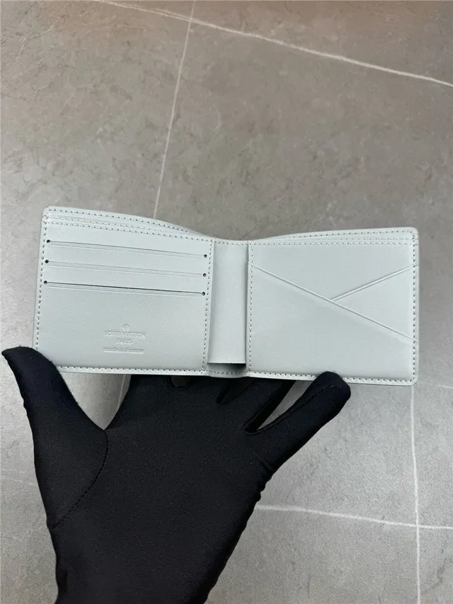 Louis Vuitton Navy White Embossed Monogram Bifold Construction Short Wallet 11