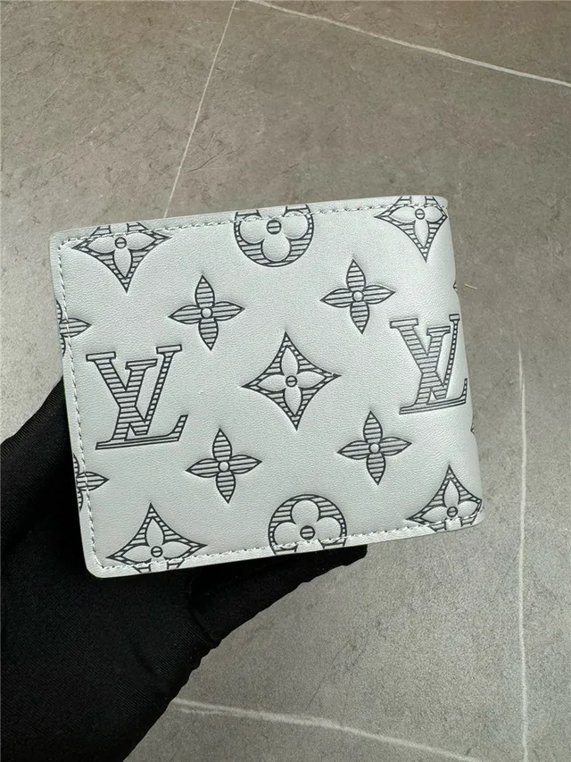 Louis Vuitton Navy White Embossed Monogram Bifold Construction Short Wallet 14