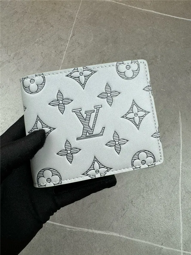 Louis Vuitton Navy White Embossed Monogram Bifold Construction Short Wallet 15