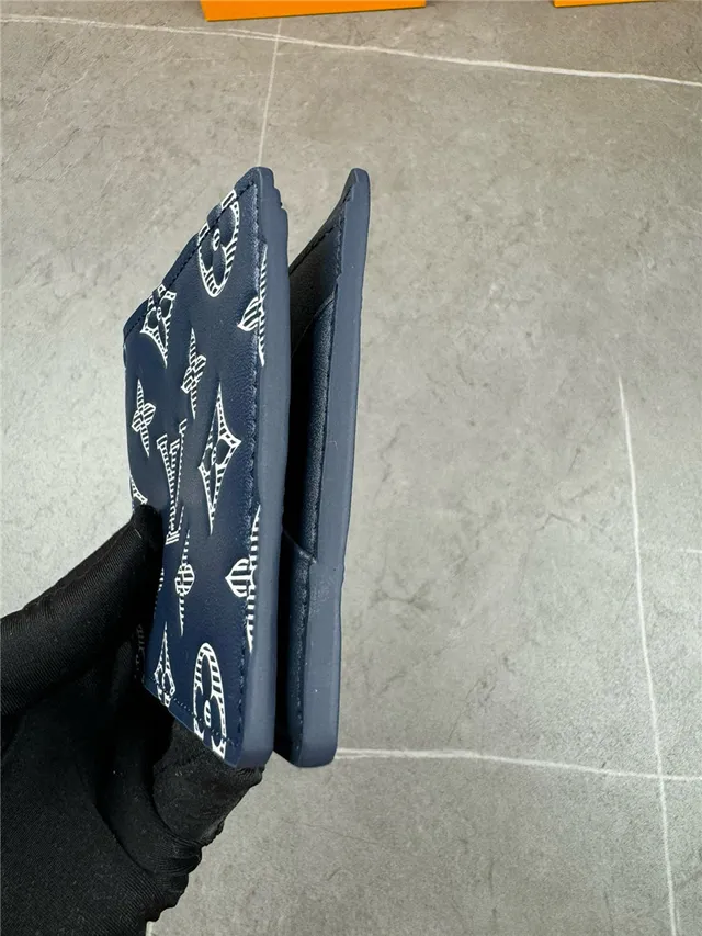 Louis Vuitton Navy White Embossed Monogram Bifold Construction Short Wallet 16