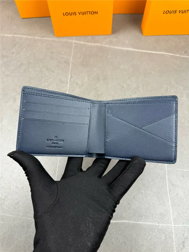 Louis Vuitton Navy White Embossed Monogram Bifold Construction Short Wallet 18