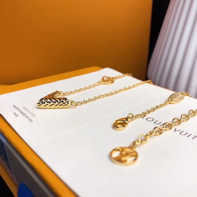 Louis Vuitton V-Shaped Textured Gold-Tone Necklace 6
