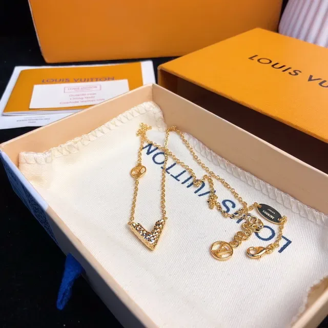 Louis Vuitton V-Shaped Textured Gold-Tone Necklace 9
