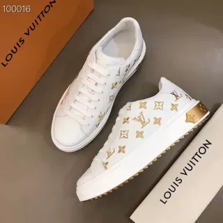 Louis Vuitton Zapatillas lifestyle blancas y doradas con impresión monograma