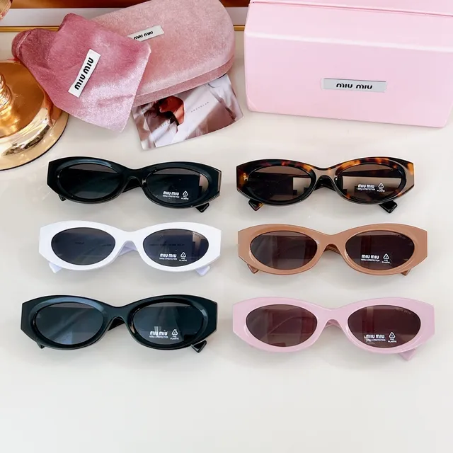 Miu Miu Lunettes de soleil rose ovale œil de chat 3
