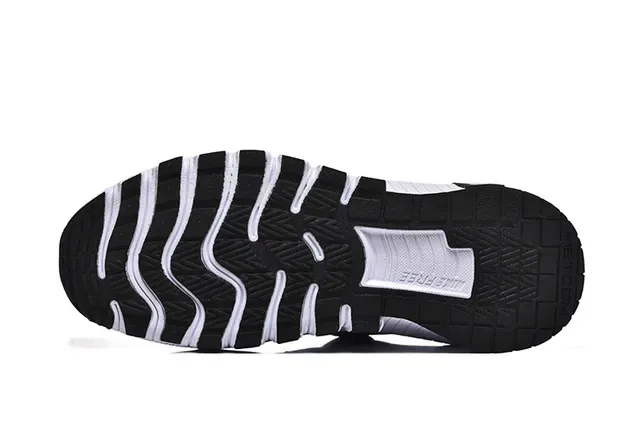 Nike Black and White Sculpted Midsole Lifestyle Sneaker 5