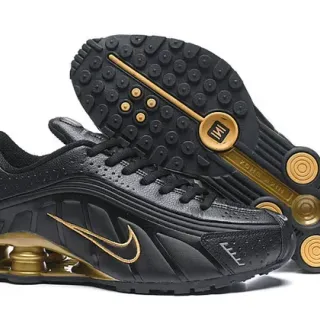 Nike Black Gold Perforated Leather Upper Shox Column Cushioning Lifestyle Sneakers