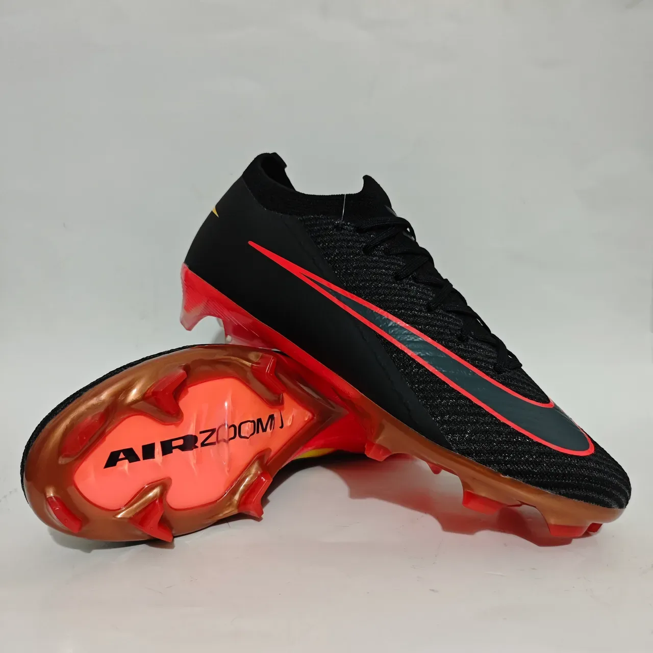 Nike Sapatos de futebol preto e vermelho com upper Flyknit, low-cut, para terreno firme 11