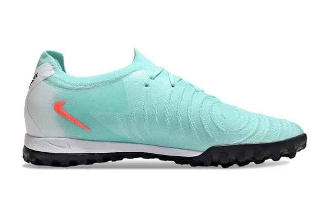 Chaussures de football Nike bleu et orange avec upper en knit et semelle turf 7