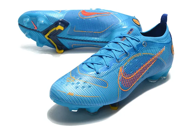 Nike chaussures de football bleu orange à talon bas avec overlay en mesh et synthétique pour terrain ferme 13