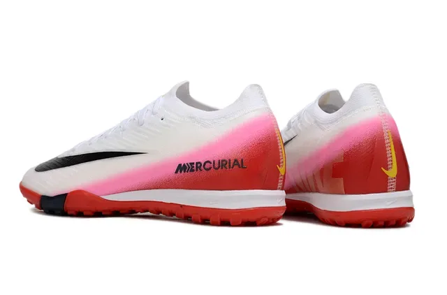 Nike Mercurial Sapatos de futebol com upper de knit, color blocking em gradiente vermelho rosa para turf 4
