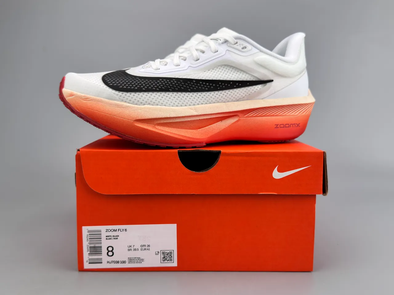 Nike White Orange Engineered Mesh Upper Sculpted ZoomX Midsole Running Shoes 2