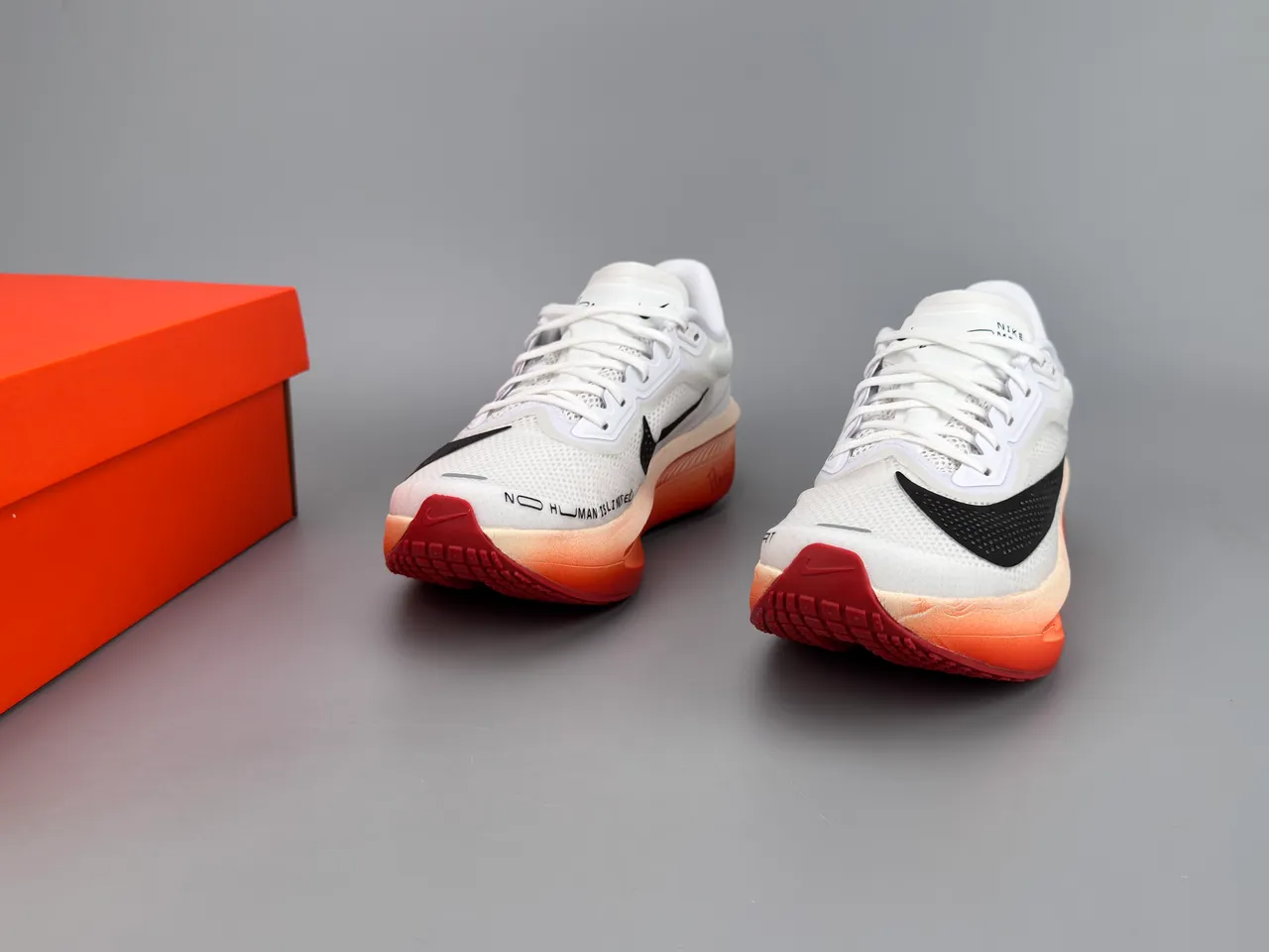 Nike White Orange Engineered Mesh Upper Sculpted ZoomX Midsole Running Shoes 3