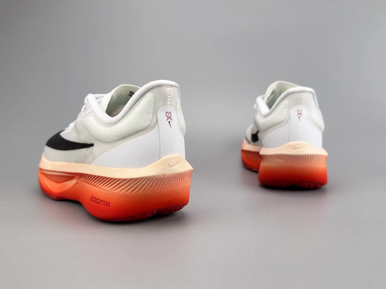Nike White Orange Engineered Mesh Upper Sculpted ZoomX Midsole Running Shoes 4