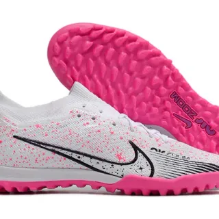 Nike Sapatos de futebol para grama com upper de knit branco e rosa, impressão de motas