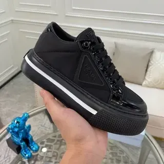 Prada Cloudbust أسود أبيض سول منصة مختلط مات/لامع أبيب حذاء رياضي أسلوب حياة