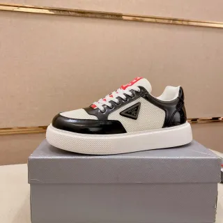 Prada Cloudbust सफेद और काला पैटेंट मेश लाइफस्टाइल स्नीकर