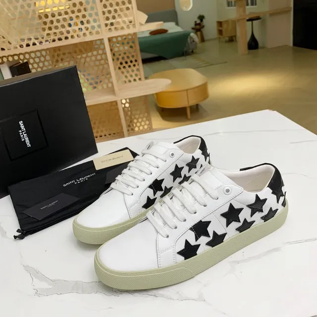 Saint Laurent sneakers lifestyle blancs noirs en cuir supérieur avec appliqués étoile 8