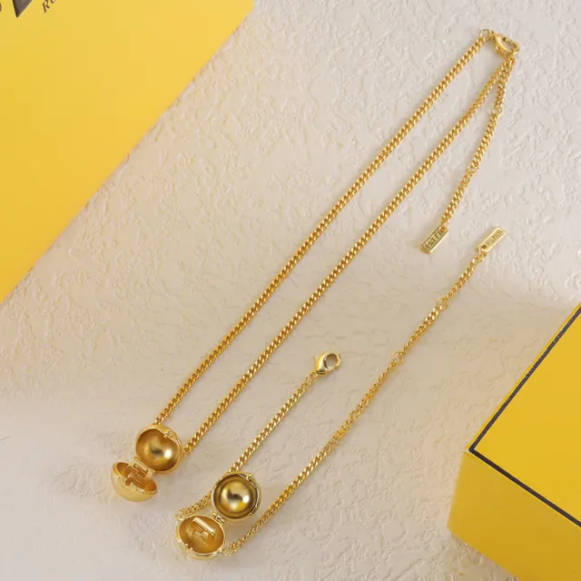 Tiffany & Co. Collier à maillons dorés, rose et gemmes transparentes 2