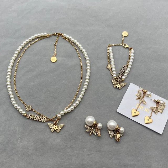 Tiffany & Co. Collier à maillons dorés, rose et gemmes transparentes 4