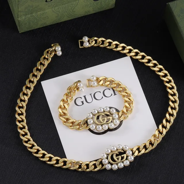Tiffany & Co. Collier à maillons dorés, rose et gemmes transparentes 7