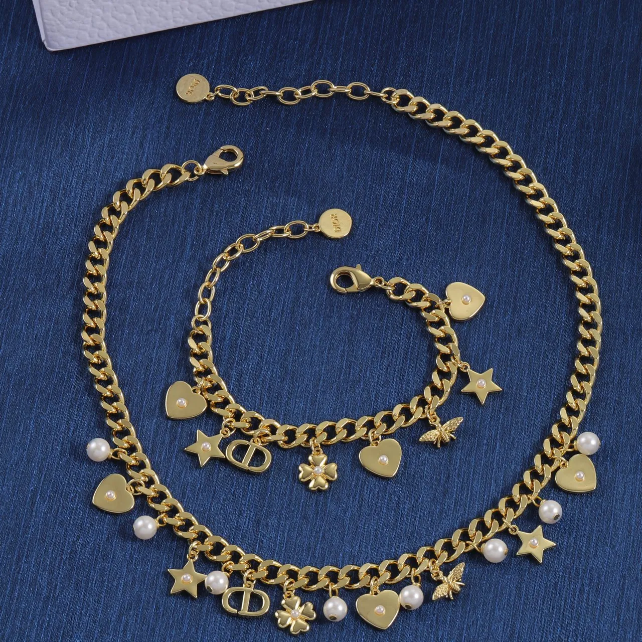 Tiffany & Co. Collier à maillons dorés, rose et gemmes transparentes 9