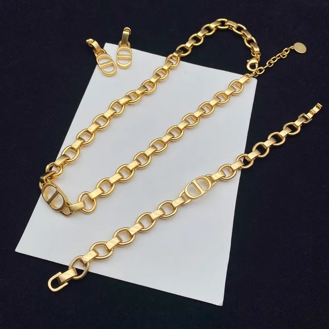 Tiffany & Co. Collier à maillons dorés, rose et gemmes transparentes 14