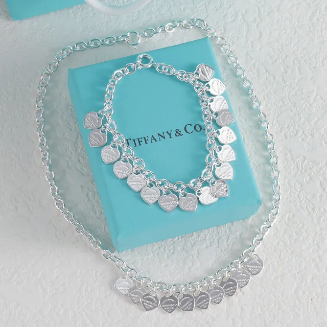 Tiffany & Co. Collier à maillons dorés, rose et gemmes transparentes 18