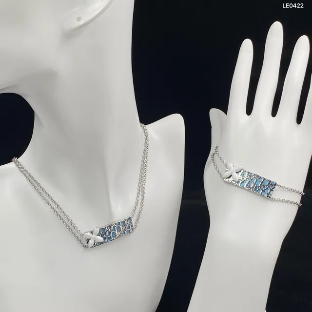 Tiffany & Co. Collier à maillons dorés, rose et gemmes transparentes 21