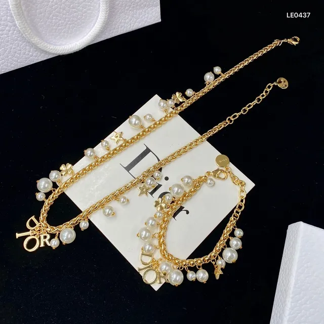 Tiffany & Co. Collier à maillons dorés, rose et gemmes transparentes 22