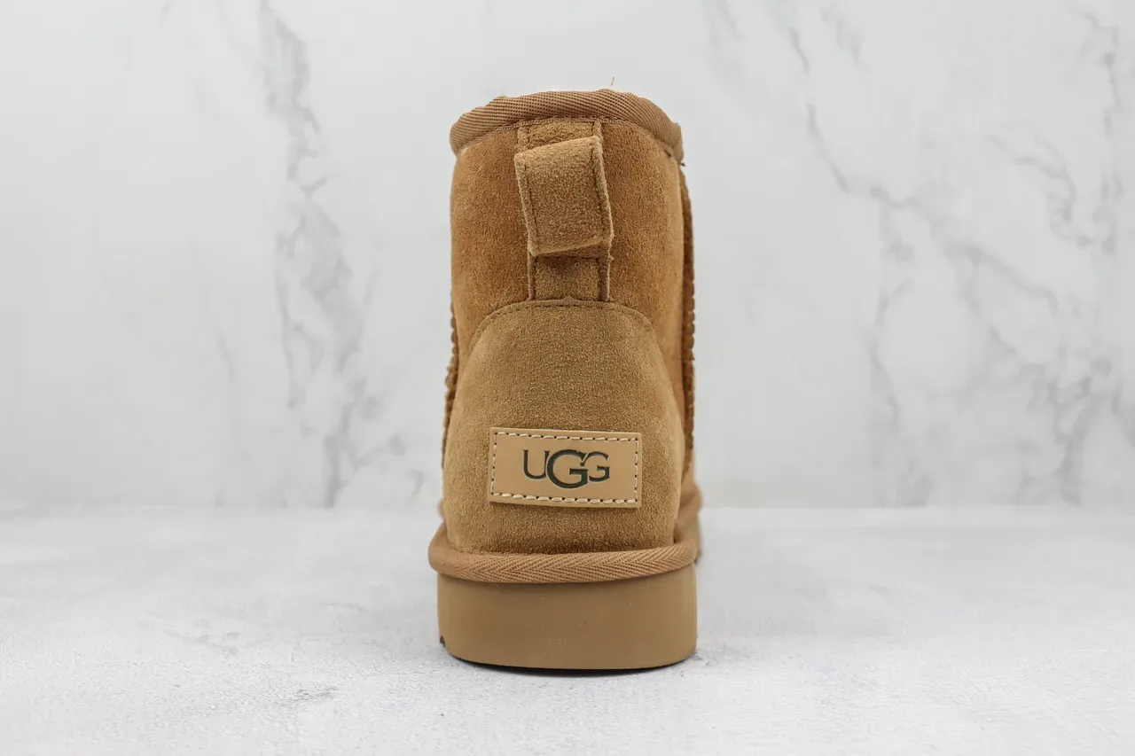 UGG Classic Short চেস্টনাট সুয়েড শিয়ারলিং লাইন্ড স্নো বুট 4