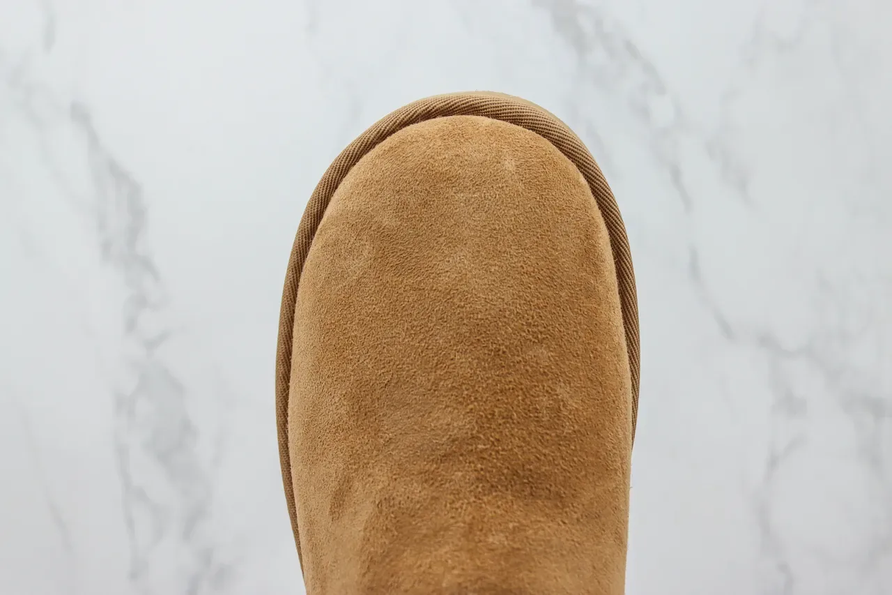 UGG Classic Short চেস্টনাট সুয়েড শিয়ারলিং লাইন্ড স্নো বুট 8