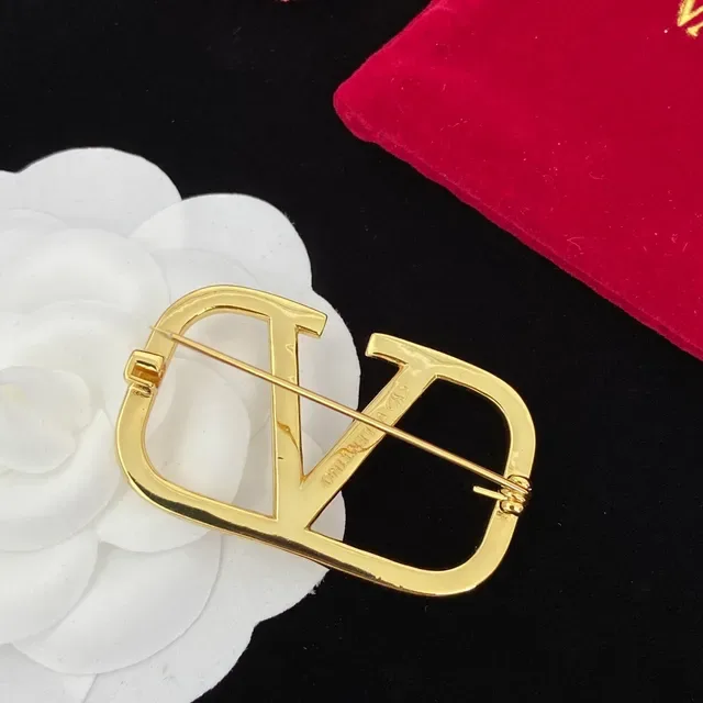Broches Valentino VLTN Logo Cristal Doré 2